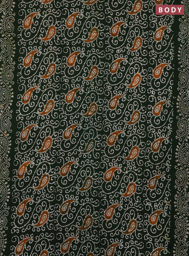 Sungudi cotton saree green with allover batik prints and printed border