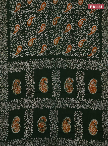 Sungudi cotton saree green with allover batik prints and printed border