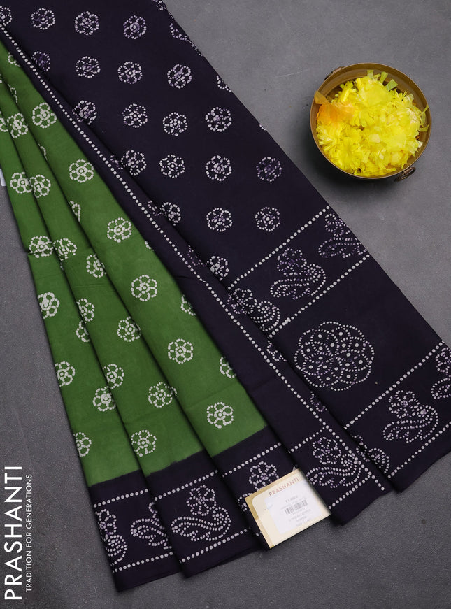 Sungudi cotton saree green and violet with allover batik butta prints and printed border