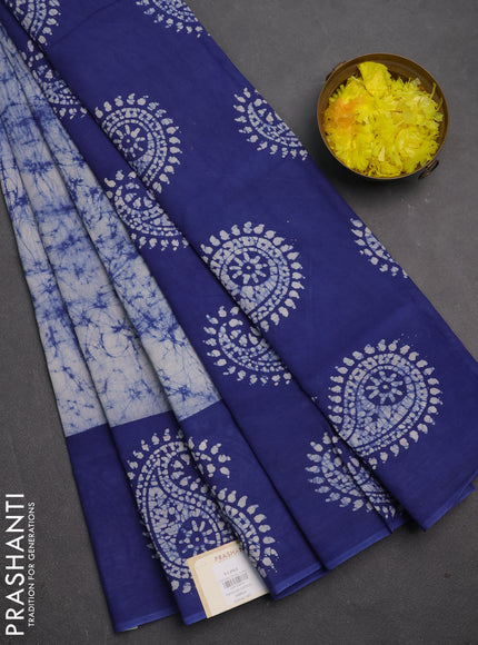 Sungudi cotton saree off white and blue with allover batik prints and printed border