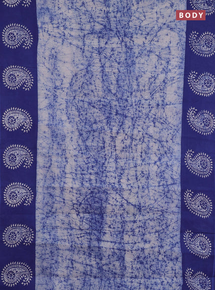 Sungudi cotton saree off white and blue with allover batik prints and printed border