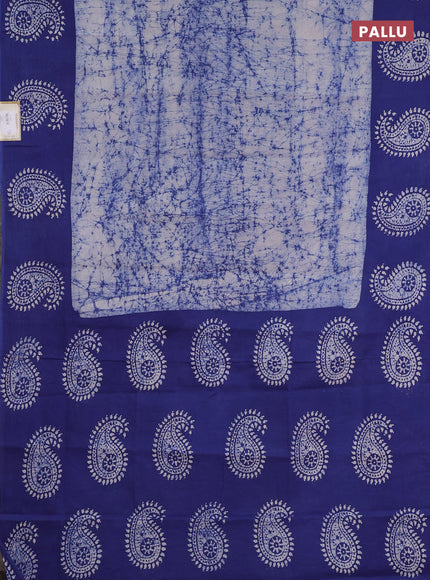 Sungudi cotton saree off white and blue with allover batik prints and printed border