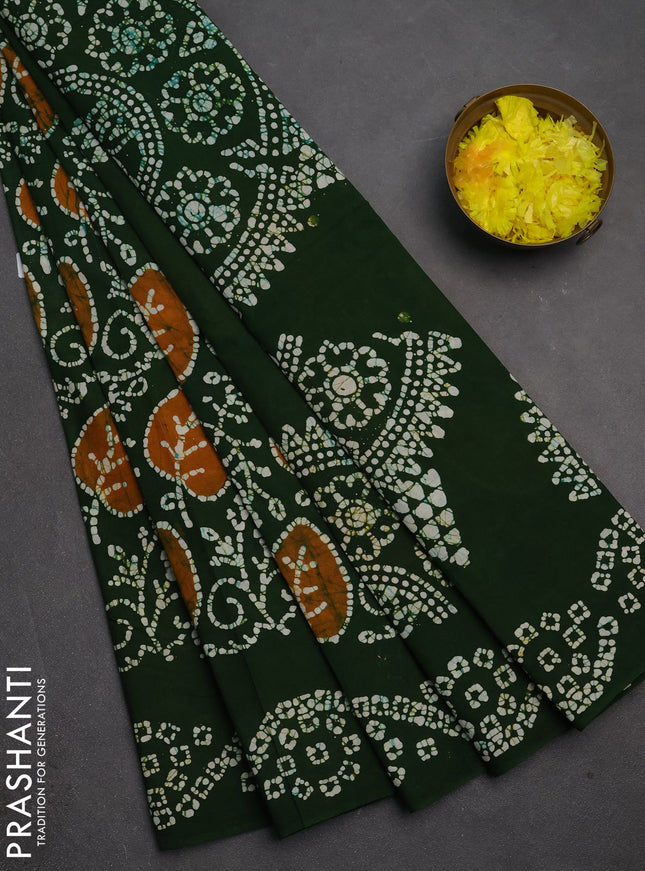 Sungudi cotton saree green with allover batik prints and printed border
