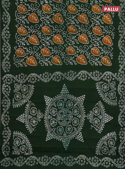 Sungudi cotton saree green with allover batik prints and printed border