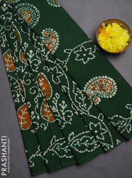 Sungudi cotton saree green with allover batik prints and printed border