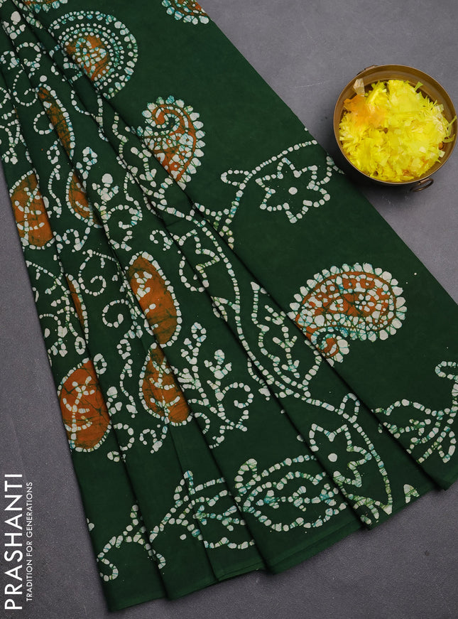 Sungudi cotton saree green with allover batik prints and printed border