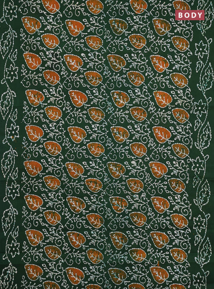 Sungudi cotton saree green with allover batik prints and printed border