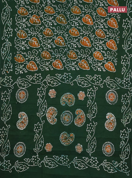 Sungudi cotton saree green with allover batik prints and printed border