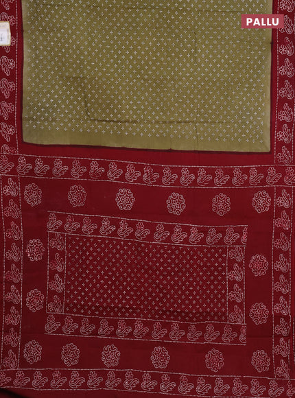 Sungudi cotton saree elaichi green and maroon with allover batik butta prints and printed border