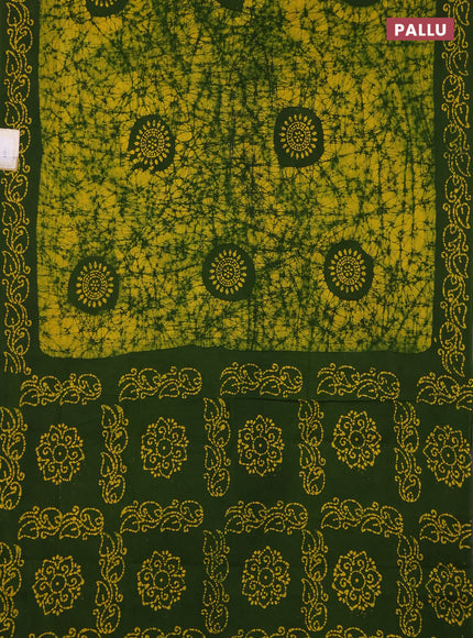 Sungudi cotton saree yellow and green with allover batik prints and printed border