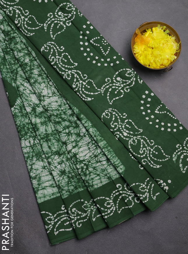 Sungudi cotton saree off white and green with allover batik prints and printed border
