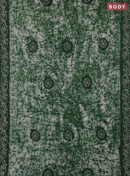 Sungudi cotton saree off white and green with allover batik prints and printed border