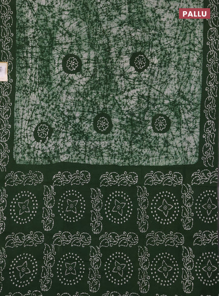 Sungudi cotton saree off white and green with allover batik prints and printed border