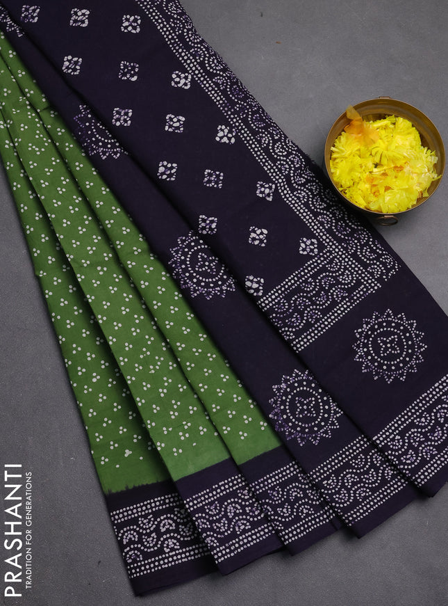 Sungudi cotton saree green and violet with allover batik butta prints and printed border