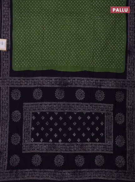 Sungudi cotton saree green and violet with allover batik butta prints and printed border