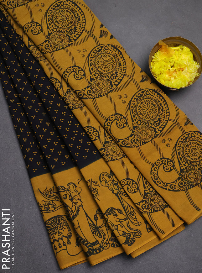 Sungudi cotton saree black and mustard yellow with allover batik butta prints and printed border