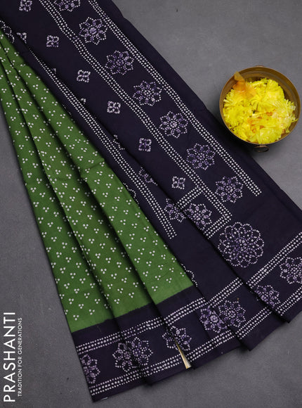 Sungudi cotton saree green and violet with allover batik butta prints and printed border