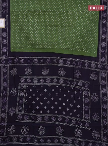 Sungudi cotton saree green and violet with allover batik butta prints and printed border
