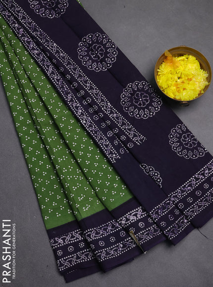 Sungudi cotton saree green and violet with allover batik butta prints and printed border