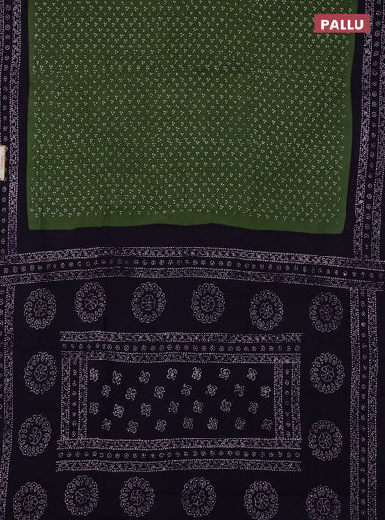 Sungudi cotton saree green and violet with allover batik butta prints and printed border
