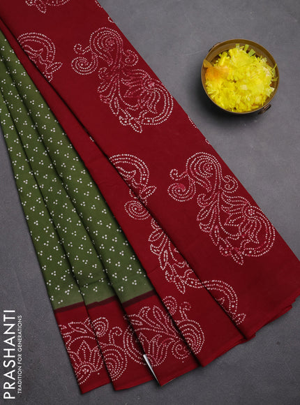Sungudi cotton saree green shade and maroon with allover batik butta prints and printed border