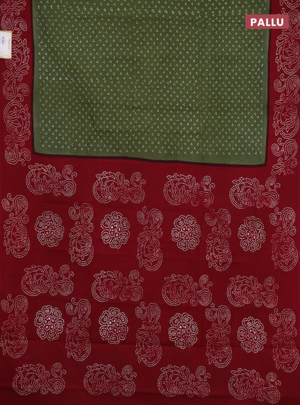 Sungudi cotton saree green shade and maroon with allover batik butta prints and printed border