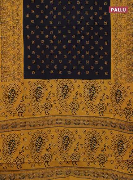 Sungudi cotton saree black and mustard yellow with allover batik butta prints and printed border