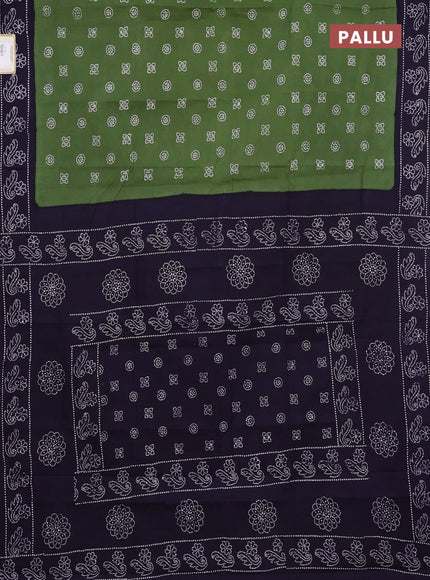 Sungudi cotton saree green and violet with allover batik butta prints and printed border