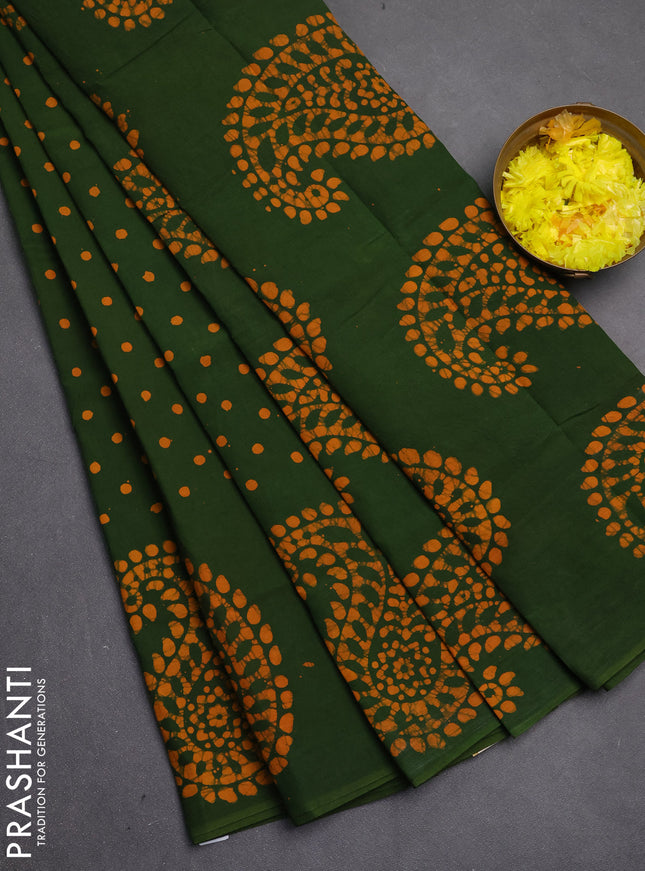 Sungudi cotton saree sap green with allover polka dot prints and paisley printed border