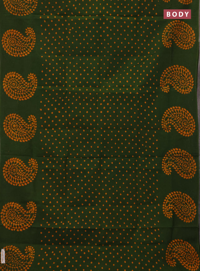 Sungudi cotton saree sap green with allover polka dot prints and paisley printed border