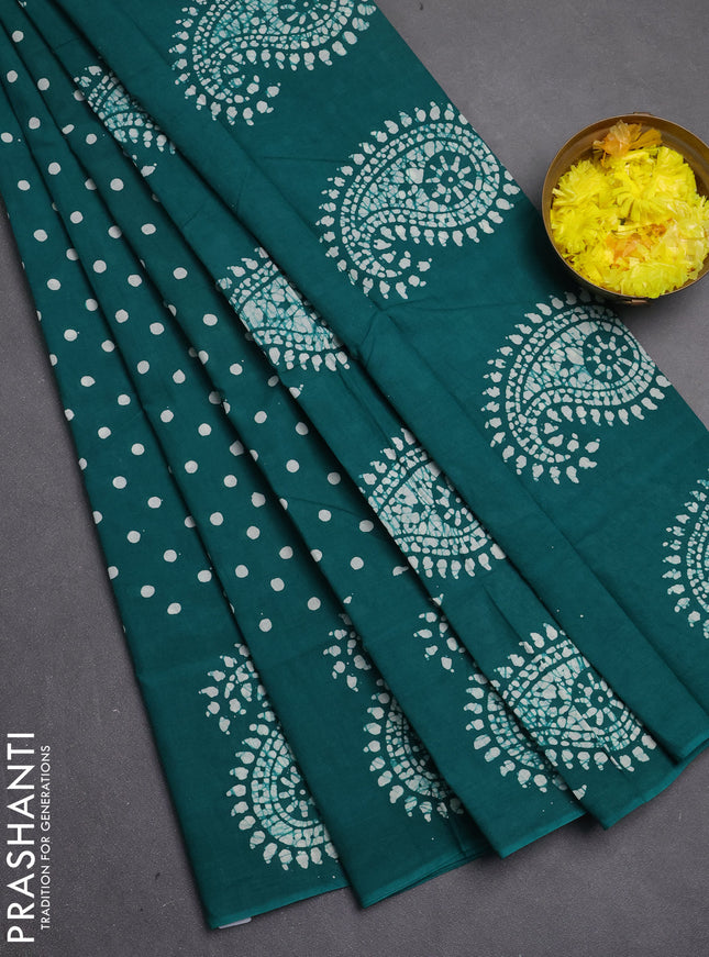 Sungudi cotton saree teal green with allover polka dot prints and paisley printed border