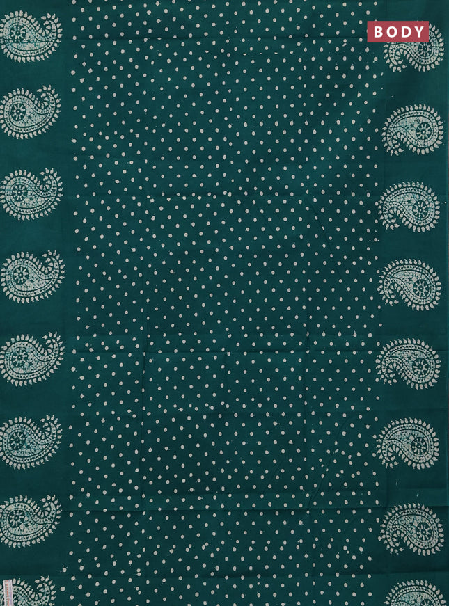 Sungudi cotton saree teal green with allover polka dot prints and paisley printed border