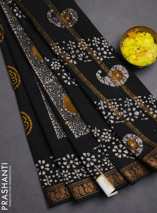 Sungudi cotton saree black with allover batik prints and zari woven border
