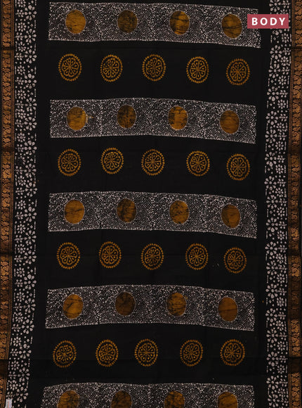 Sungudi cotton saree black with allover batik prints and zari woven border