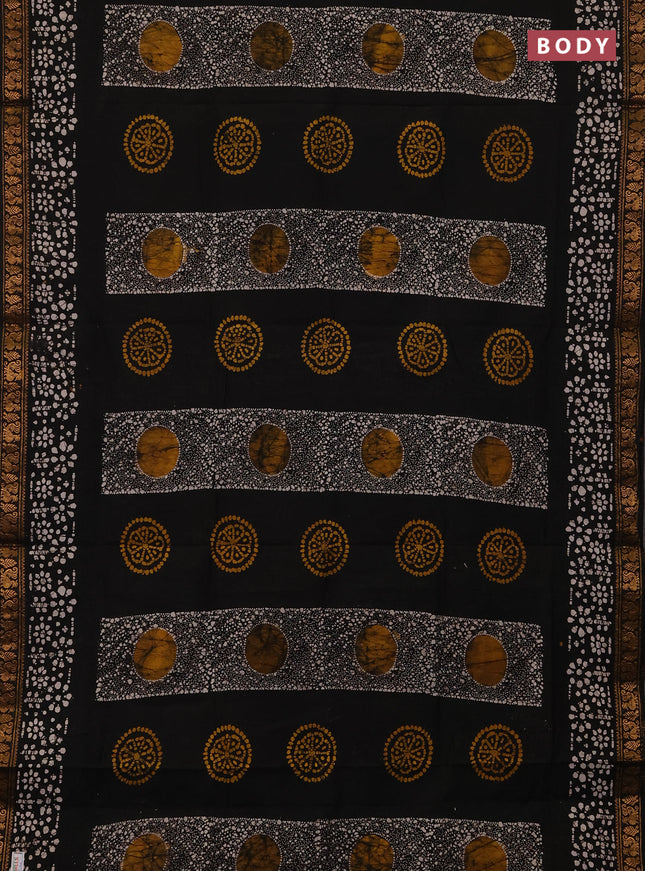 Sungudi cotton saree black with allover batik prints and zari woven border