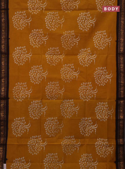 Sungudi cotton saree mustard yellow and coffee brown with allover batik butta prints and zari woven border