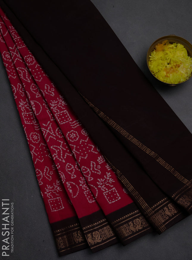 Sungudi cotton saree pink and coffee brown with allover batik prints and zari woven border