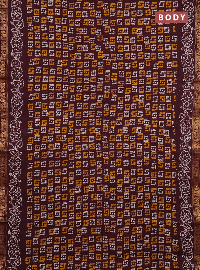 Sungudi cotton saree deep brown with allover batik butta prints and printed zari woven border