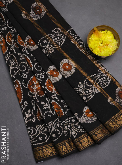 Sungudi cotton saree black with allover batik prints and zari woven printed border