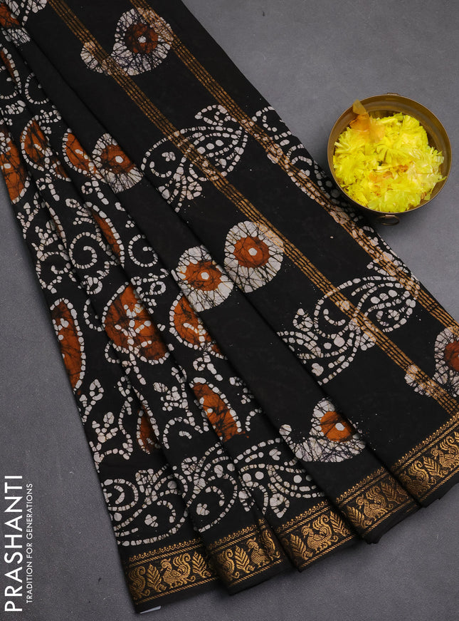 Sungudi cotton saree black with allover batik prints and zari woven printed border