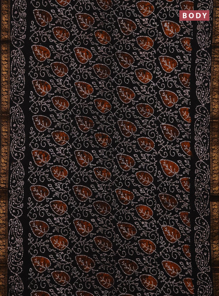 Sungudi cotton saree black with allover batik prints and zari woven printed border