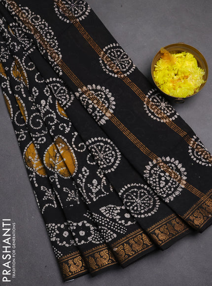 Sungudi cotton saree black with allover batik prints and zari woven printed border