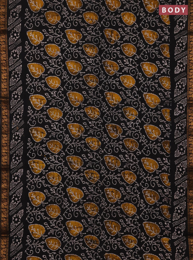 Sungudi cotton saree black with allover batik prints and zari woven printed border