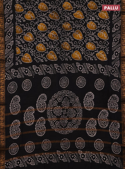 Sungudi cotton saree black with allover batik prints and zari woven printed border