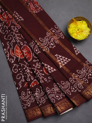 Sungudi cotton saree deep brown with allover batik prints and zari woven printed border