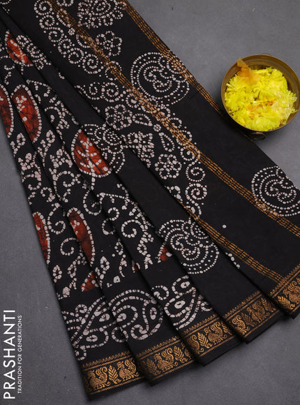 Sungudi cotton saree black with allover batik prints and zari woven printed border