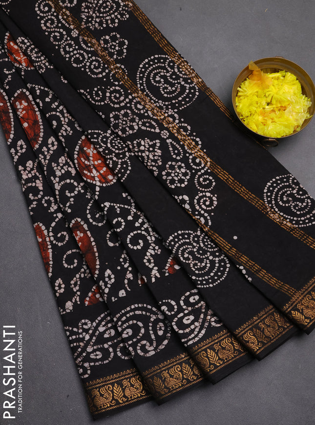 Sungudi cotton saree black with allover batik prints and zari woven printed border