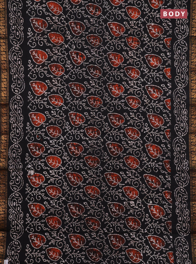 Sungudi cotton saree black with allover batik prints and zari woven printed border