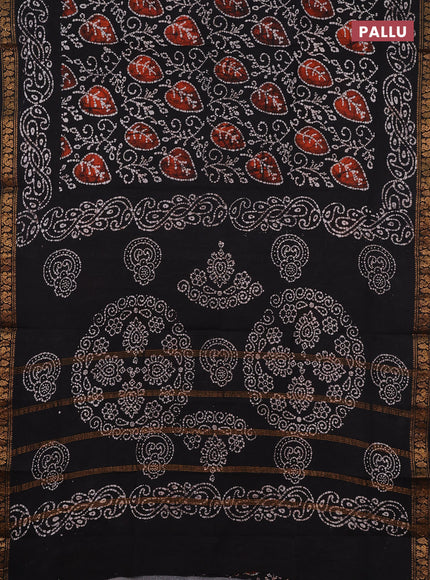 Sungudi cotton saree black with allover batik prints and zari woven printed border