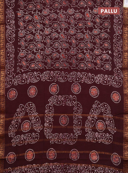 Sungudi cotton saree deep brown with allover batik prints and zari woven printed border